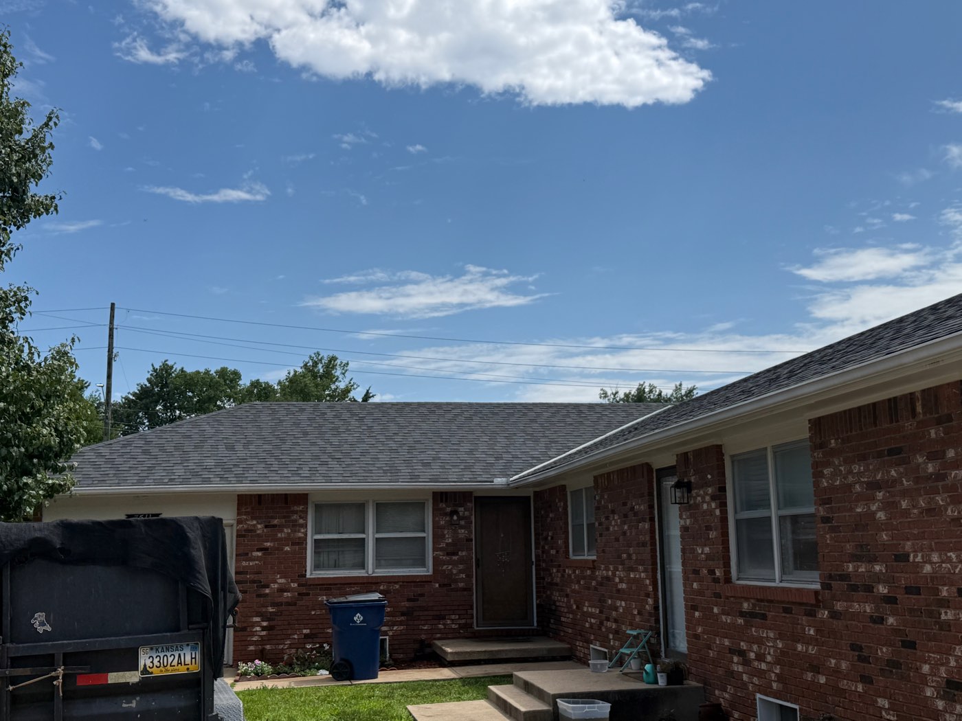 Completed roof on a brick ranch home